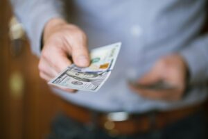 Businessman holding money in his hands