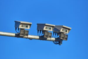 Urban traffic control surveillance camera. Big data city monitoring system