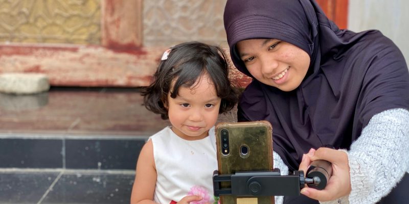 Sisters taking selfie photo