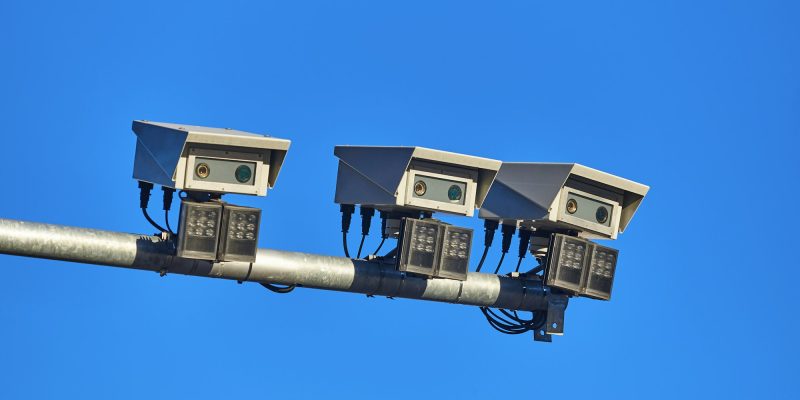 Urban traffic control surveillance camera. Big data city monitoring system